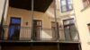 Altbaucharme trifft modernen Wohnkomfort - 4-Raum-Erdgeschosswohnung mit Sauna und großzügigem Balkon ! - Blick auf Balkonfassade