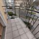 Denkmalgeschütztes Mehrfamilienhaus mit 9,7 % Rendite und weiterem Entwicklungsspielraum - Balkon mit Straßenblick