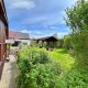 Wohnen im Grünen - Einfamilienhaus mit 5 Ferienwohnungen - Ferienwohnanlage - Vorgarten