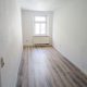 Sonnige 3-Raum-Eigentumswohnung in zentraler Lage - Helles Zimmer mit Laminat